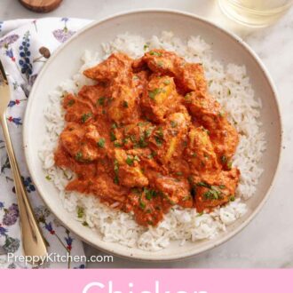 Pinterest graphic of an overhead view of a bowl of rice with chicken tikka masala on top.