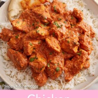 Pinterest graphic of a close view of chicken tikka masala on top of rice and torn naan.