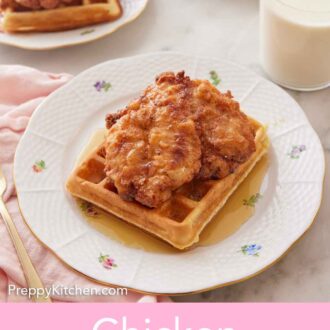 Pinterest graphic of a plate of chicken and waffles with a second plate, butter, and a glass of milk in the back.