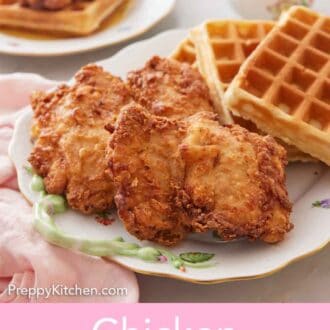 Pinterest graphic of a platter with three waffles and three pieces of chicken.