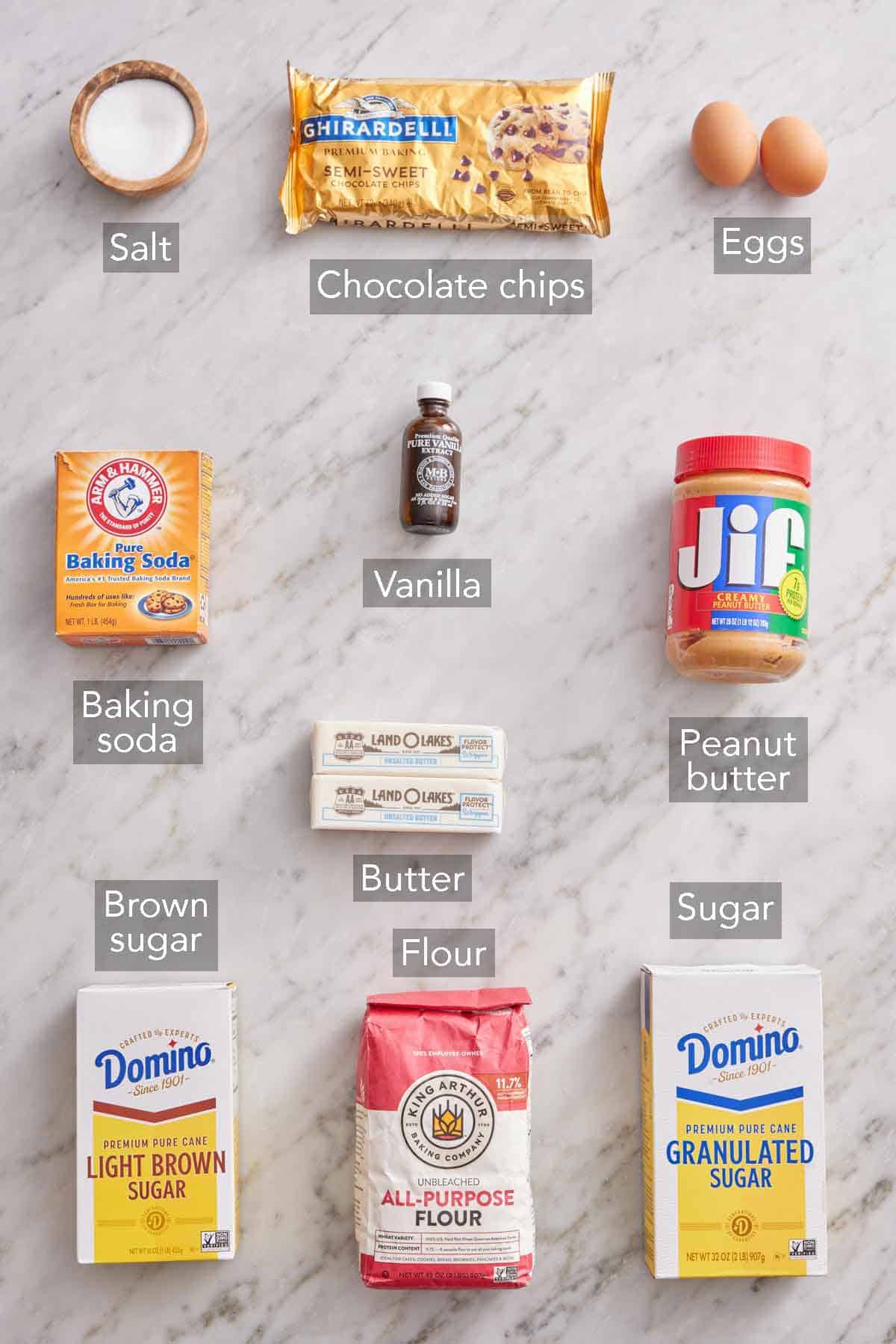 Ingredients needed to make peanut butter chocolate chip cookies.