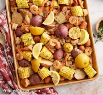 Pinterest graphic of an overhead view of a sheet pan of shrimp boil.