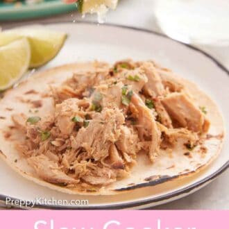Pinterest graphic of a tortilla with slow cooker carnitas on top with a lime wedge squeezed on top.