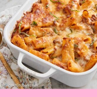 Pinterest graphic of a white baking dish of baked rigatoni.