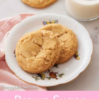 Pinterest graphic of a plate with two brown sugar cookies with a glass of milk in the back.