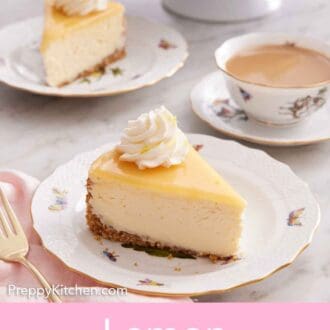 Pinterest graphic of a plate with a slice of lemon cheesecake with another slice, cup of coffee, and a cake stand in the background.