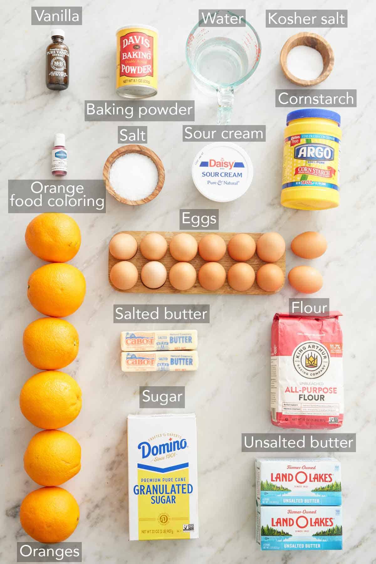 Ingredients needed to make an orange creamsicle cake.