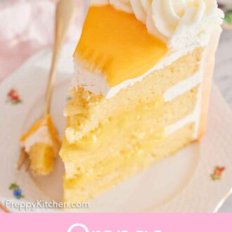 Pinterest graphic of a slice of orange creamsicle cake on a plate with the tip scooped onto a fork on the side.