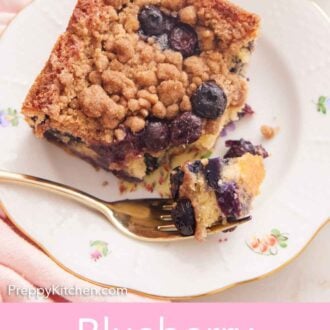 Pinterest graphic of a plate with a piece of blueberry buckle with the corner bit on a fork.