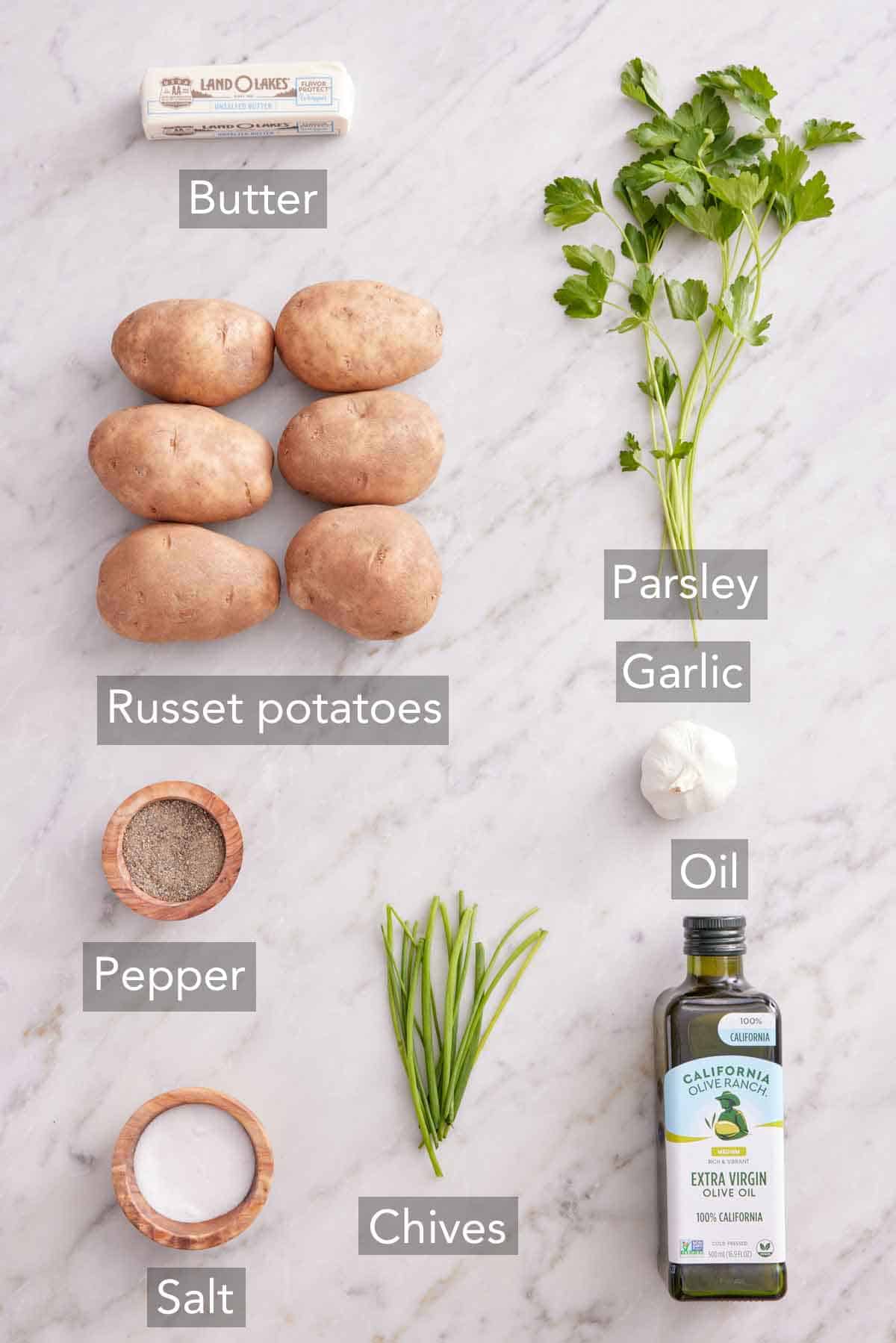 Ingredients needed to make hasselback potatoes.