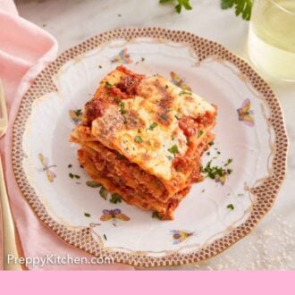 Pinterest graphic of a plate with a square piece of lasagna.