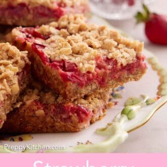 Pinterest graphic of a close up view of a few strawberry rhubarb bars on a plate.