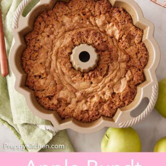 Pinterest graphic of an overhead view of apple bundt cake in a bundt pan. A cooling rack and apples off to the sides.