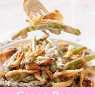 Pinterest graphic of a forkful of green bean casserole lifted from a plate.