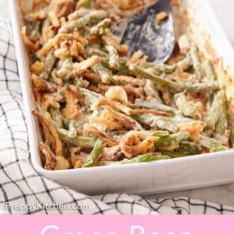 Pinterest graphic of a baking dish with green bean casserole with a serving spoon inside.