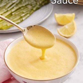 Pinterest graphic of a bowl of hollandaise sauce with a spoonful lifted up with the sauce drizzling off.