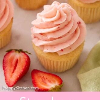 Pinterest graphic of a cupcake topped with strawberry frosting with a cut strawberry and additional cupcakes off to the side.