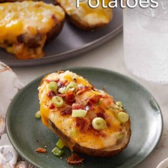 Pinterest graphic of a plate with a twice baked potato topped with green onions with a platter with more in the background.