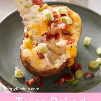 Pinterest graphic of a forkful lifting up a bite of twice baked potato on a plate.