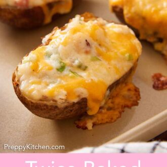 Pinterest graphic of freshly twice baked potatoes on a sheet pan.