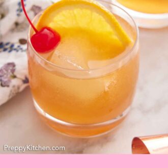 Pinterest graphic of a glass of Amaretto Sour with fruit garnish.