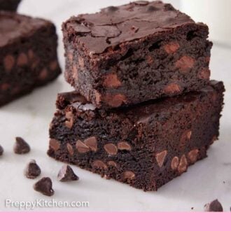 Pinterest graphic of a stack of two brownies with some chocolate chips scattered.