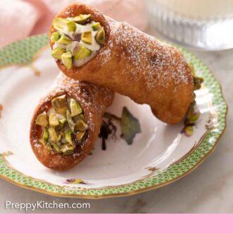 Pinterest graphic of two cannoli with pistachios on a plate.