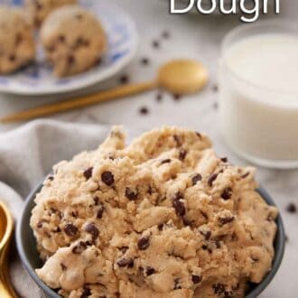 Pinterest graphic of a bowl of edible cookie dough with a glass of milk in the background.