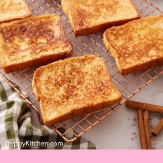 Pinterest graphic of french toasts on a wire cooling rack.