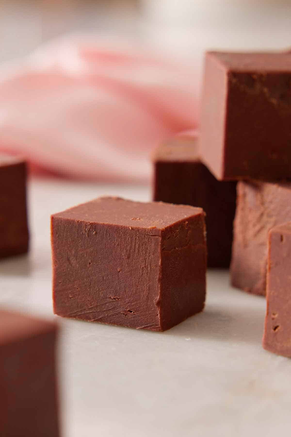 Multiple pieces of fudge cut into squares.
