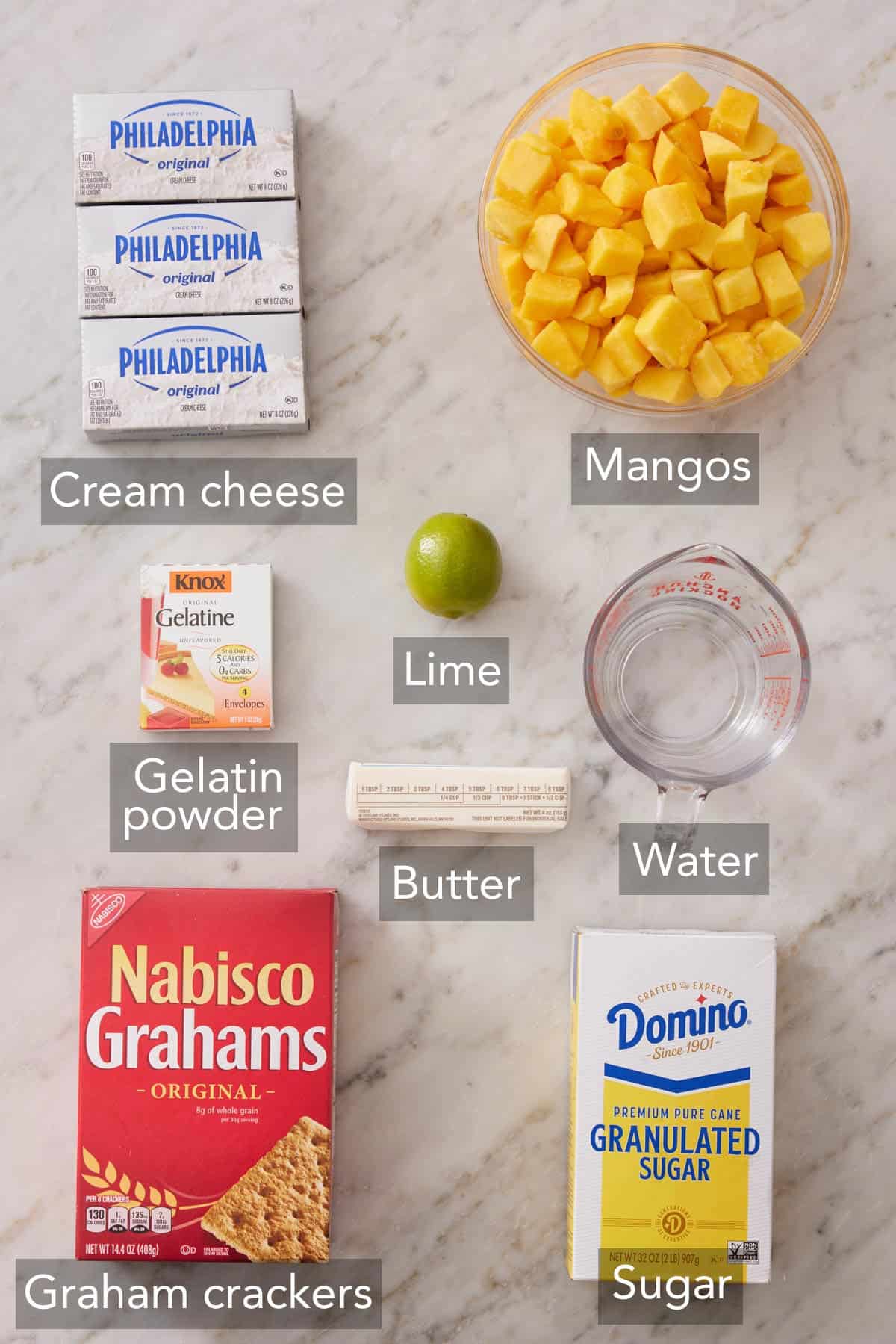 Ingredients needed to make mango cheesecake.