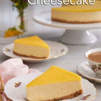 Pinterest graphic of two slices of mango cheesecake on two plates with a cake stand in the background with the rest of the cake.