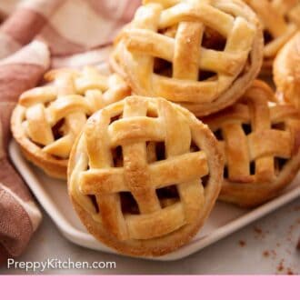 Pinterest graphic of mini apple pies on a platter.
