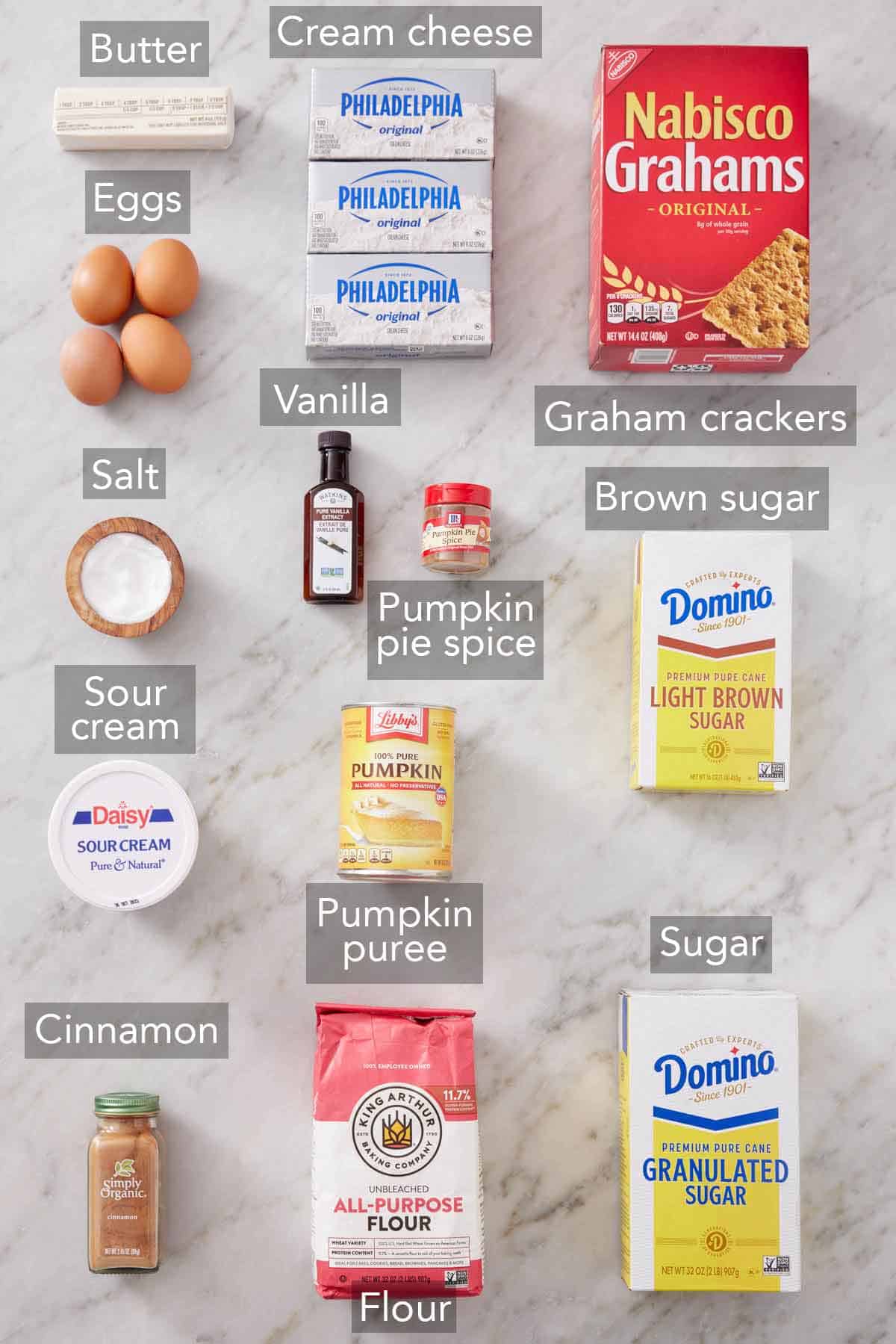 Ingredients needed to make pumpkin cheesecake.