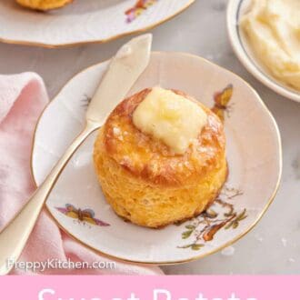Pinterest graphic of a plate with a sweet potato biscuit topped with butter with additional biscuits on a plate, butter, and salt in the background.