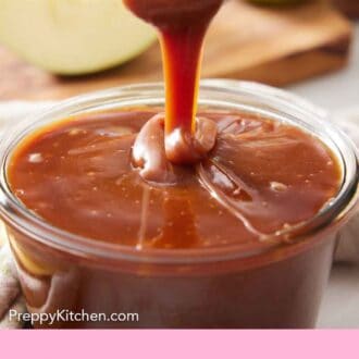 Pinterest graphic of a spoonful of caramel sauce lifted from a jar.