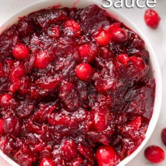 Pinterest graphic of an overhead view of a bowl of cranberry sauce with pieces of whole cranberries.
