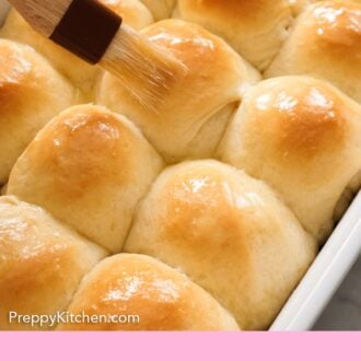 Pinterest graphic of butter brushed over dinner rolls in a backing dish.