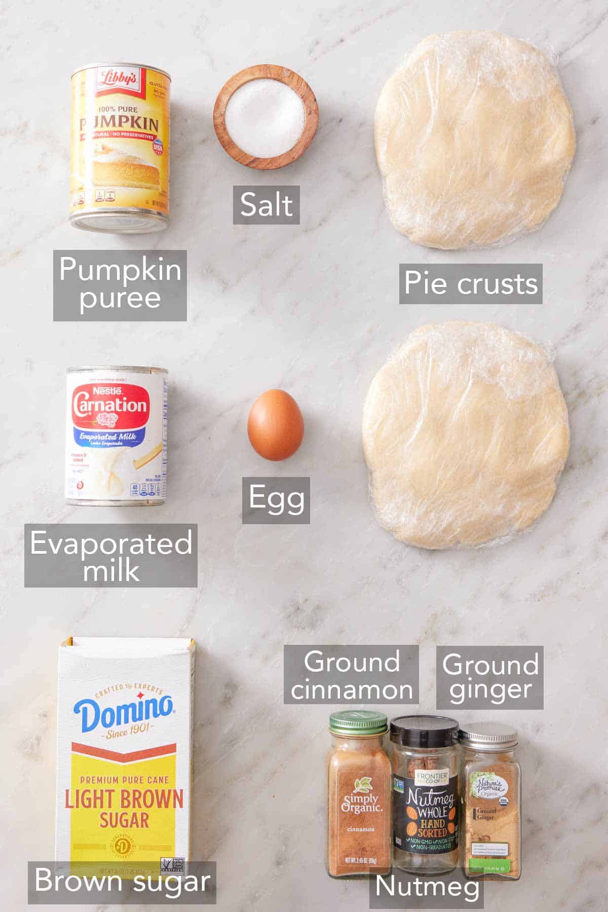 Ingredients needed to make mini pumpkin pies.