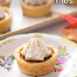 Pinterest graphic of a plate with a mini pumpkin pie topped with whipped cream. More pies out of focus in the background.