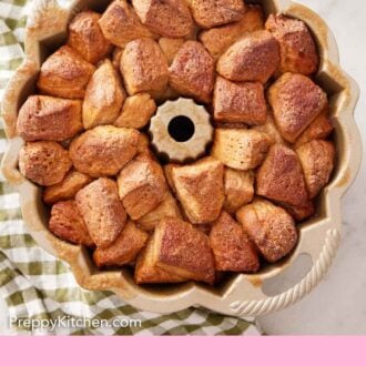 Pinterest graphic of an overhead view of monkey bread in the baking dish.