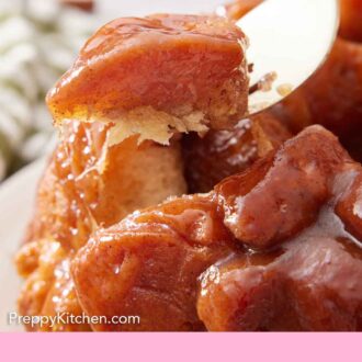 Pinterest graphic of a fork lifting up a piece of monkey bread.