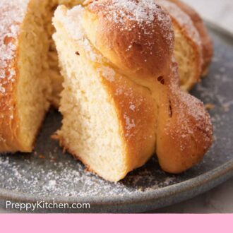 Pinterest graphic of a loaf of Pan de Muerto with a slice cut and pulled out.