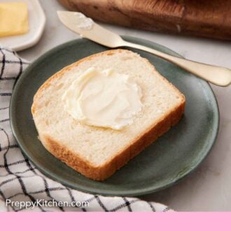 Pinterest graphic of a slice of potato bread smeared with butter.
