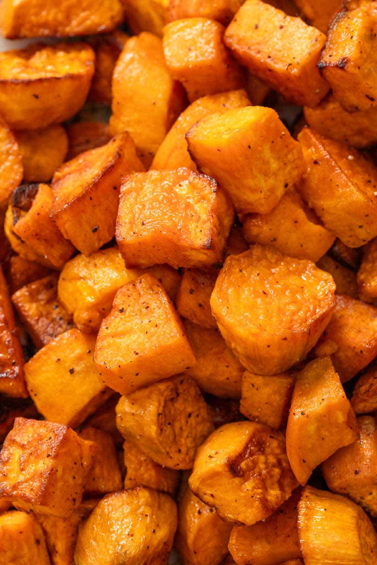 A close up view of roasted sweet potatoes.
