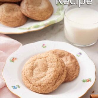 Pinterest graphic of a plate with two snickerdoodle cookies with a glass of milk and additional cookies in the background.