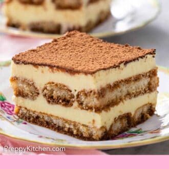 Pinterest graphic of a side view showing the layers of tiramisu on a plate. A second piece of tiramisu in the background.