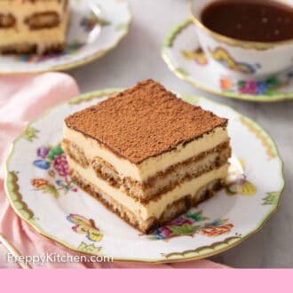 Pinterest graphic of serving of tiramisu on a plate with a cup of coffee and second slice in the background.