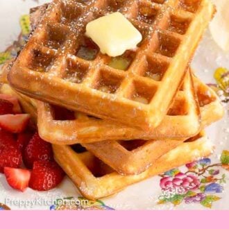 Pinterest graphic of a stack of waffles with syrup, powdered sugar, and butter on top.