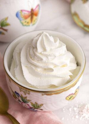 A small bowl of whipped cream.